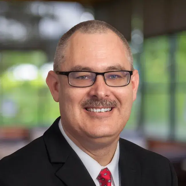 Headshot of John Maderia