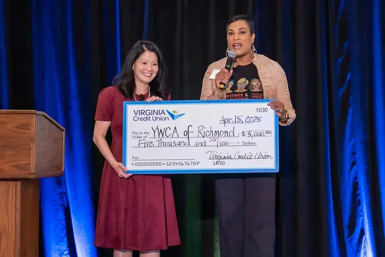 VACU presenting check for donation to YWCA