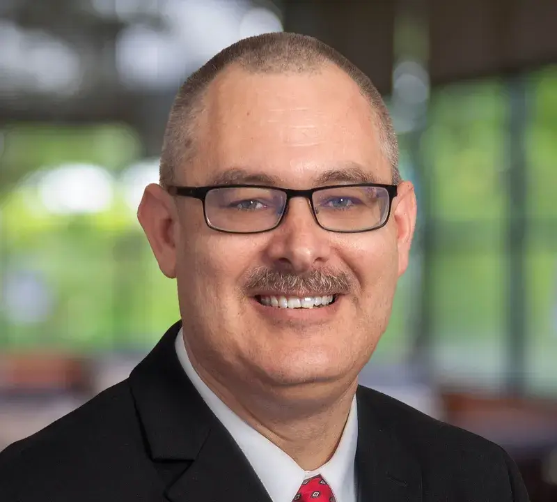 Headshot of John Maderia