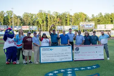 Virginia Credit Union (VACU) and the Fredericksburg Nationals team celebrate donation to help combat hunger and food insecurity