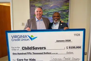 Virginia Credit Union President/CEO Chris Shockley presenting donation in support of ChildSavers' comprehensive approach to helping children overcome trauma.