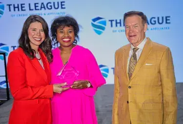 Sabrina Guerin accepting award for 2025 Emerging Professional of the Year for Virginia