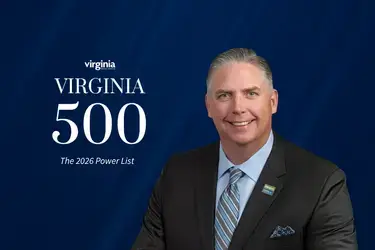 Headshot of Chris Shockley with blue background and Virginia 500 graphic overlaid on the left