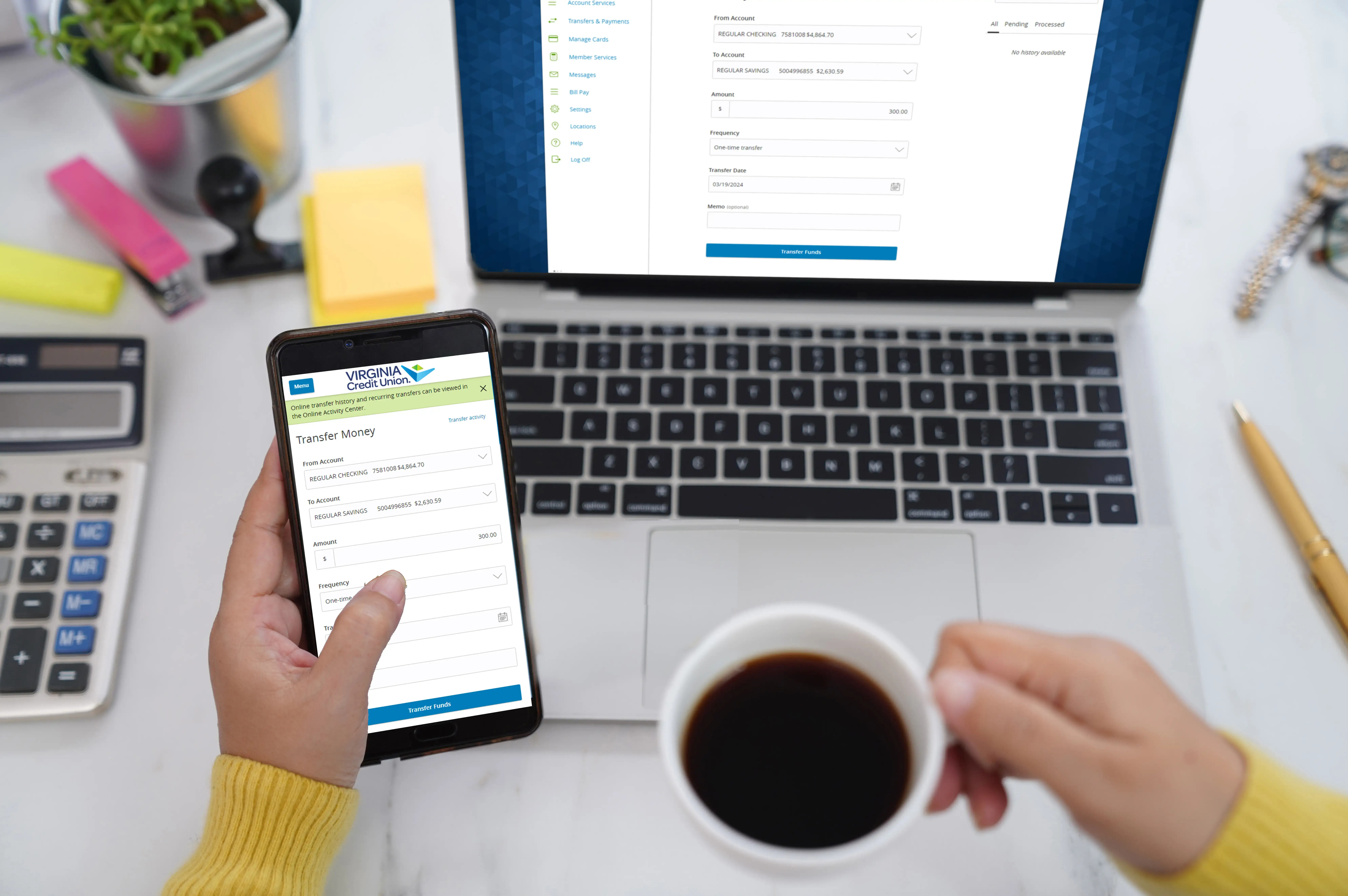 Person checking accounts on laptop and phone
