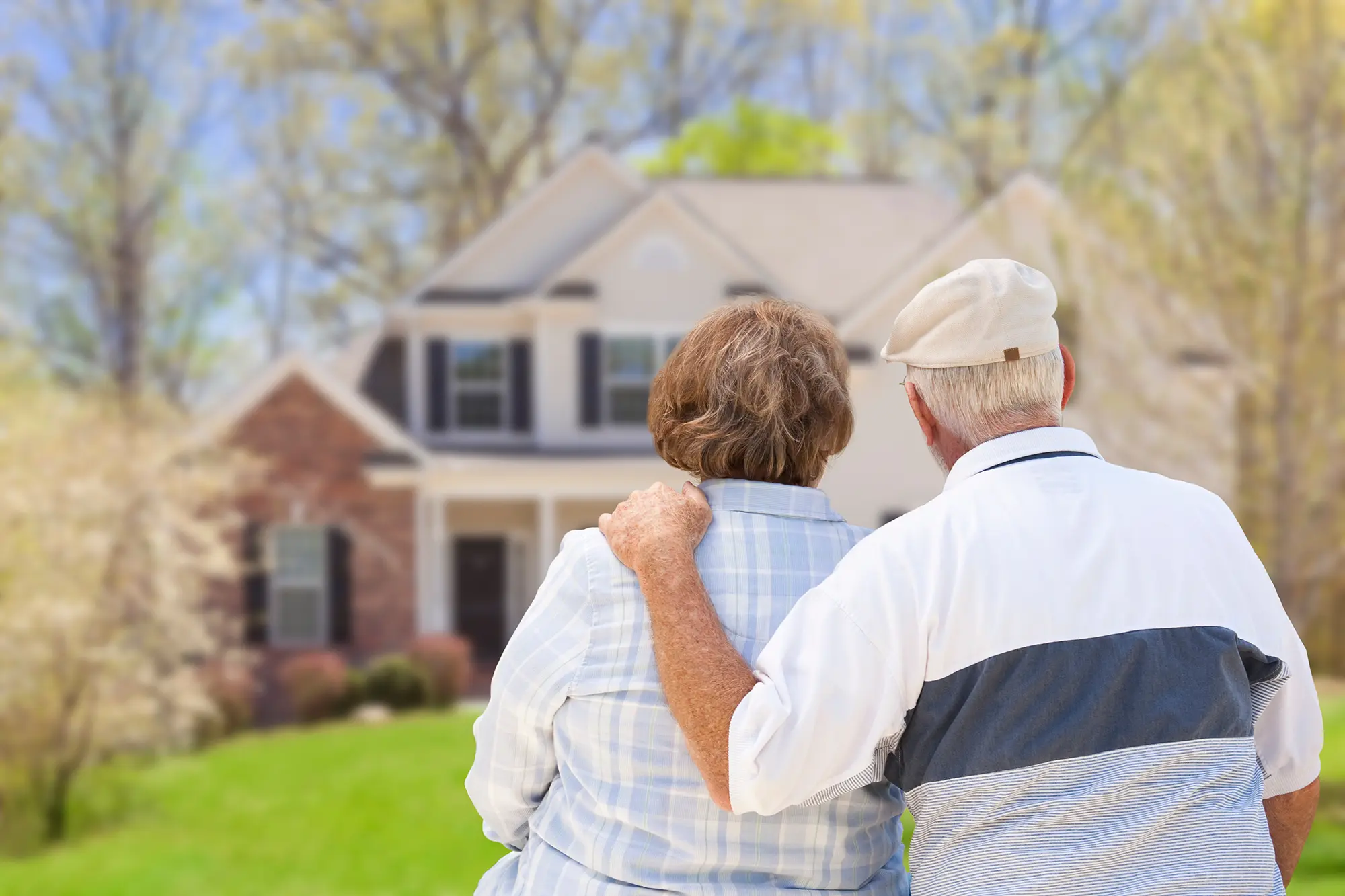 Adobe Stock 54120953 Retired Senior Couple Looking at Front of House copy