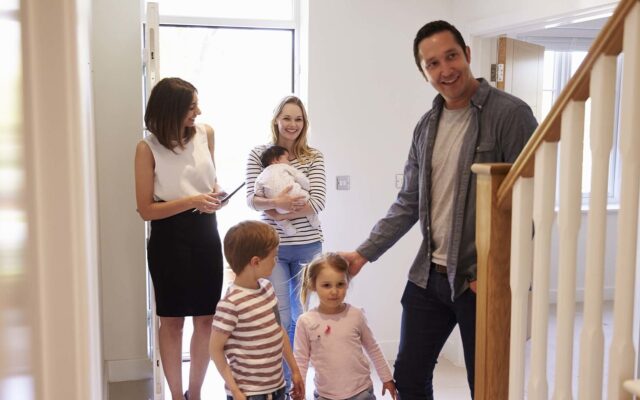 Realtor leads young family into home 978b8d064138018a1dfad71b9882dd21