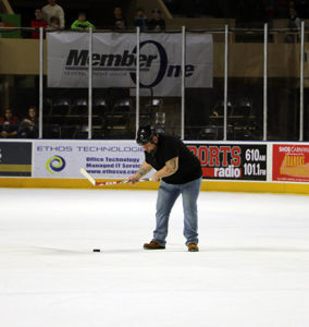 Guns and Hoses puck shot web 284x300