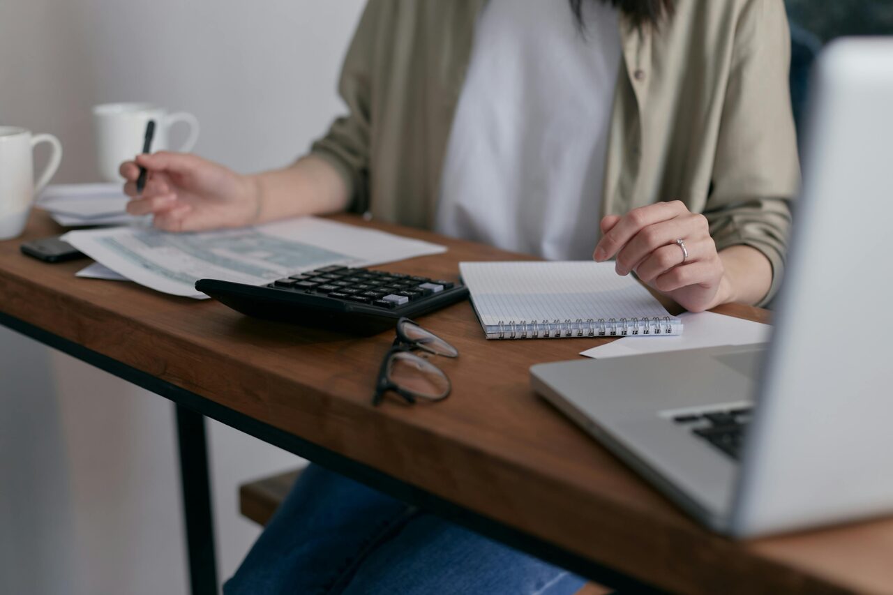 Woman with calculator