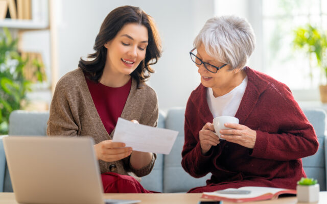 Adobe Stock 413973671 women with a paper receipt