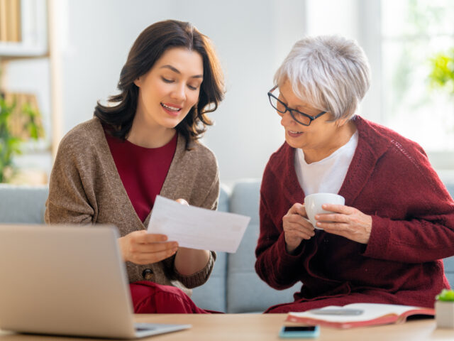 Adobe Stock 413973671 women with a paper receipt