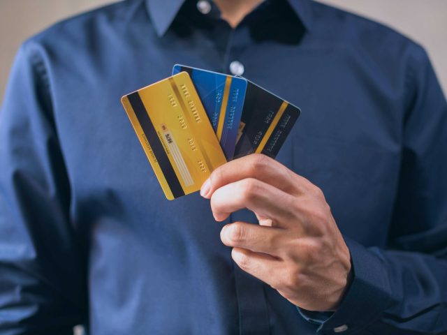 Man w credit cards Aukid Phumsirichat