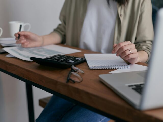 Woman with calculator